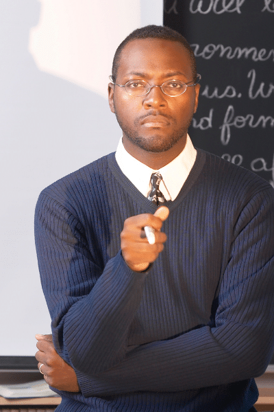 picture of an african american teacher - tenure law