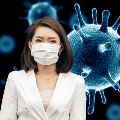 Asian woman wearing a white mask to protect against COVID-19
